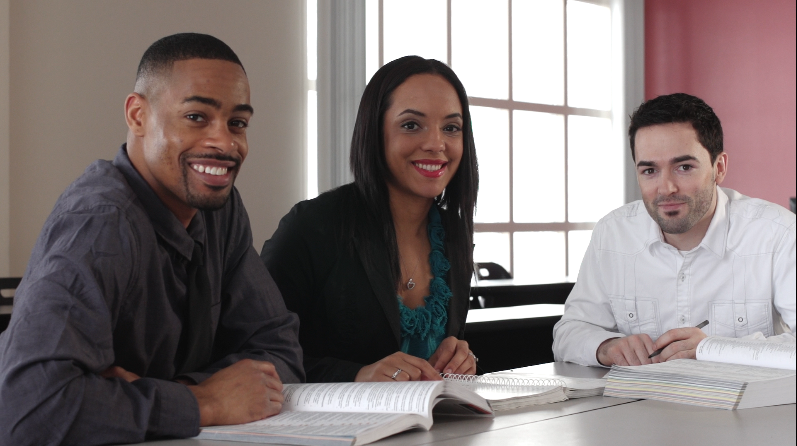 Alaska Career College students studying together in a classroom